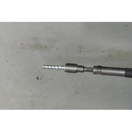 Application image of concrete screw BTS6 E with connecting thread: BTS plugged onto the setting tool for hexagon head screws ready for assembly