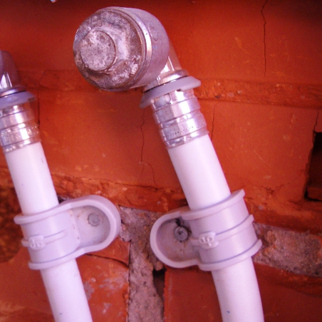 Application Image of the FP Conduit Clip to a Brick Wall