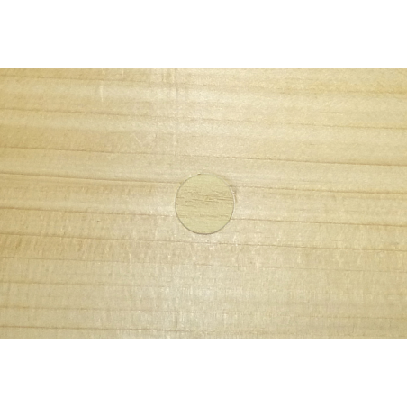 Application image of self-adhesive PVC cover Magic Tap MT: Maple Magic Tap on an imitation wood surface